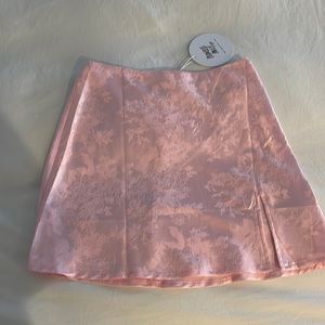 Princess Polly Silk Pink Mini Skirt Size 4 NWT.